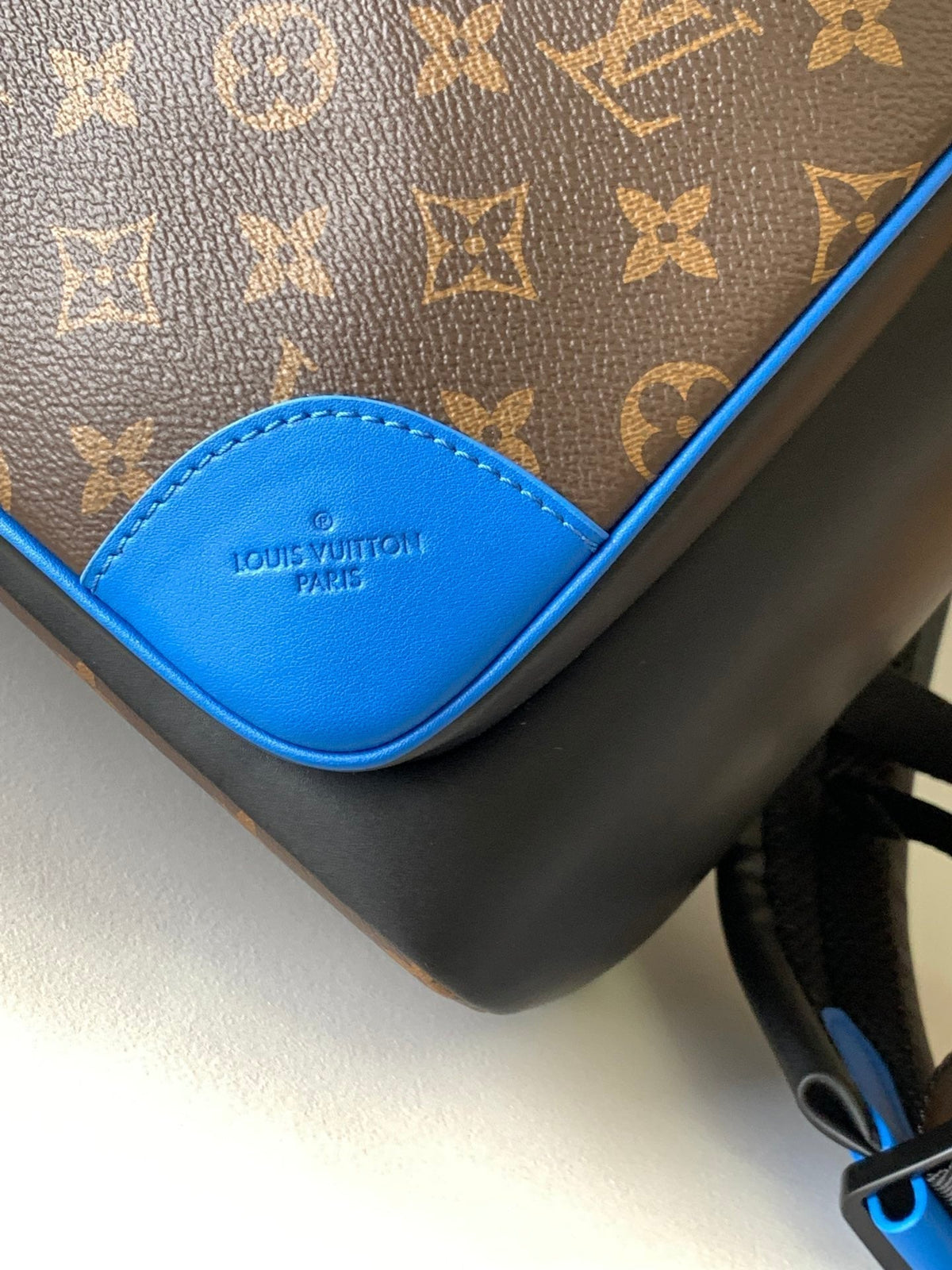 LOUIS VUITTON DEAN BACKPACK 42 IN BLUE AND BROWN MONOGRAM CANVAS