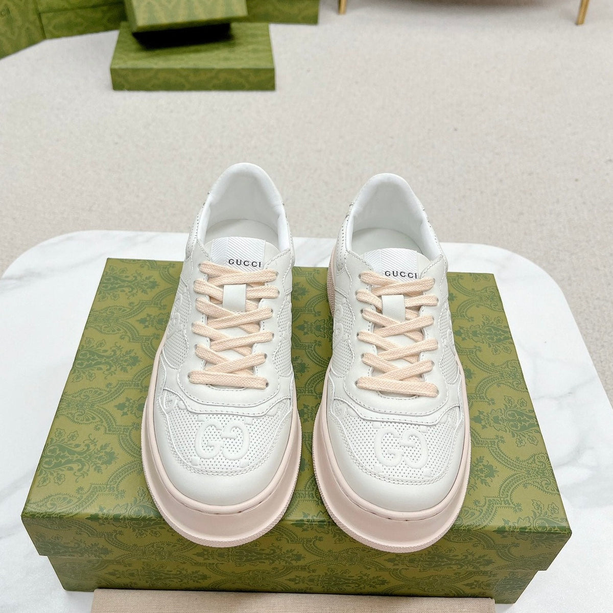 GUCCI EMBOSSED TRAINER WHITE AND PASTEL PINK CALFSKIN