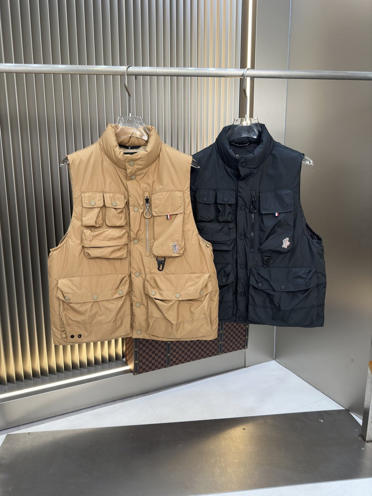 Moncler Quilted Utility Down Vest — comparison