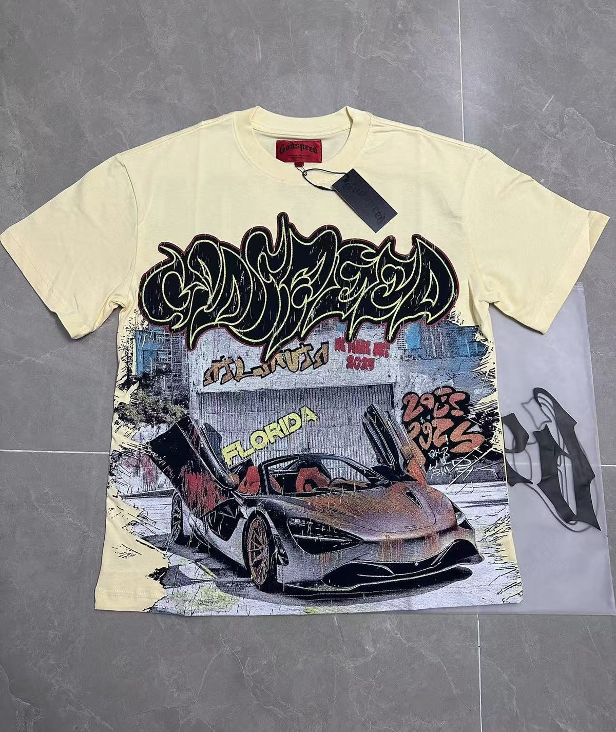 Godspeed Out of Many One Car Graphic T-Shirt — context