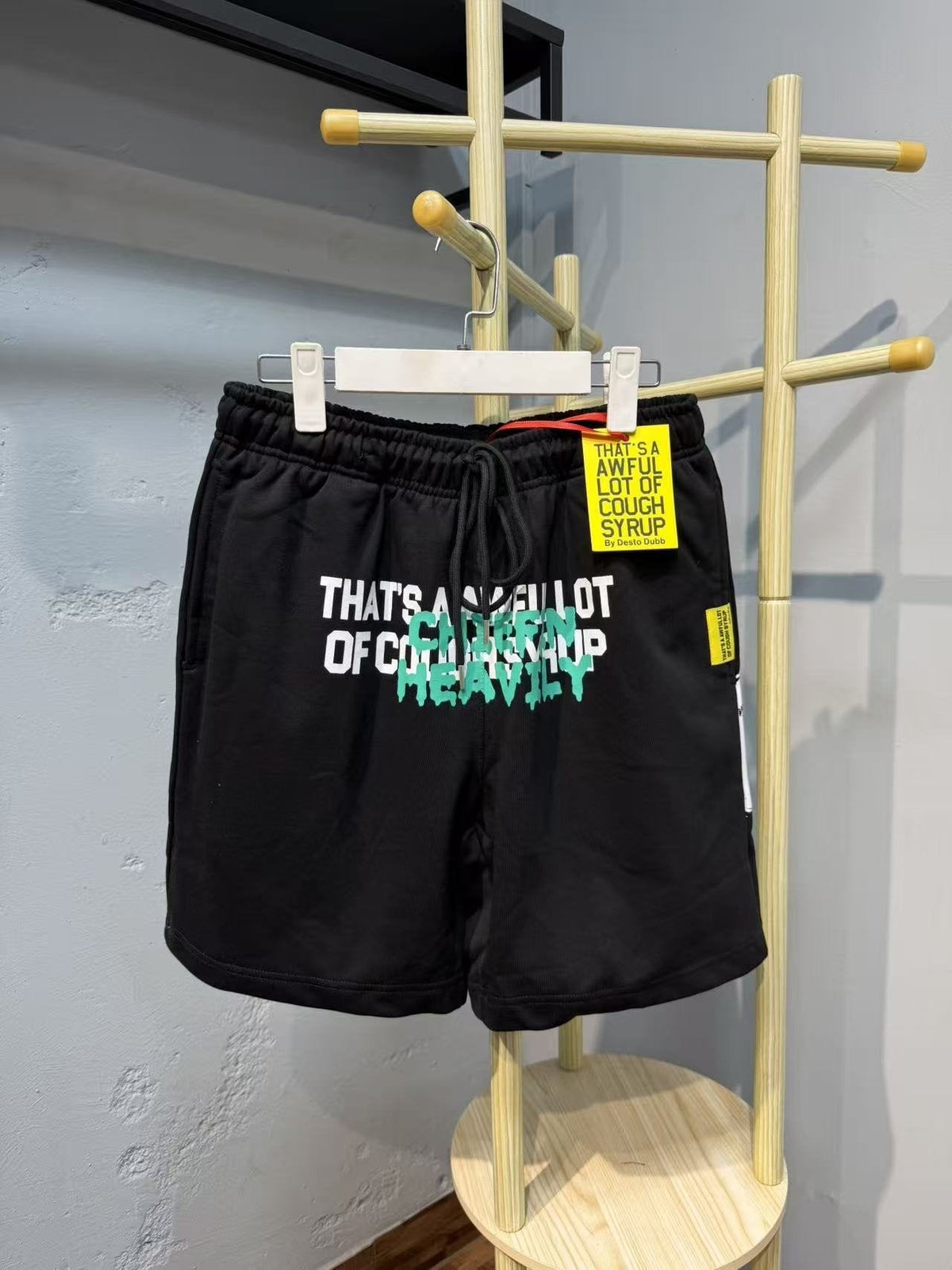 THAT'S A AWFUL LOT OF COUGH SYRUP Drawstring Graphic Shorts — context