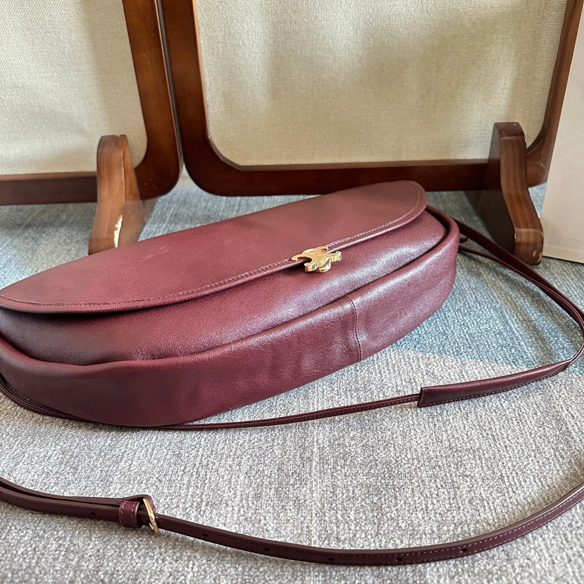 CELINE 25S HALFMOON SOFT TRIOMPHE BAG 46MM IN SYRAH RED SUPPLE SHINY LAMBSKIN