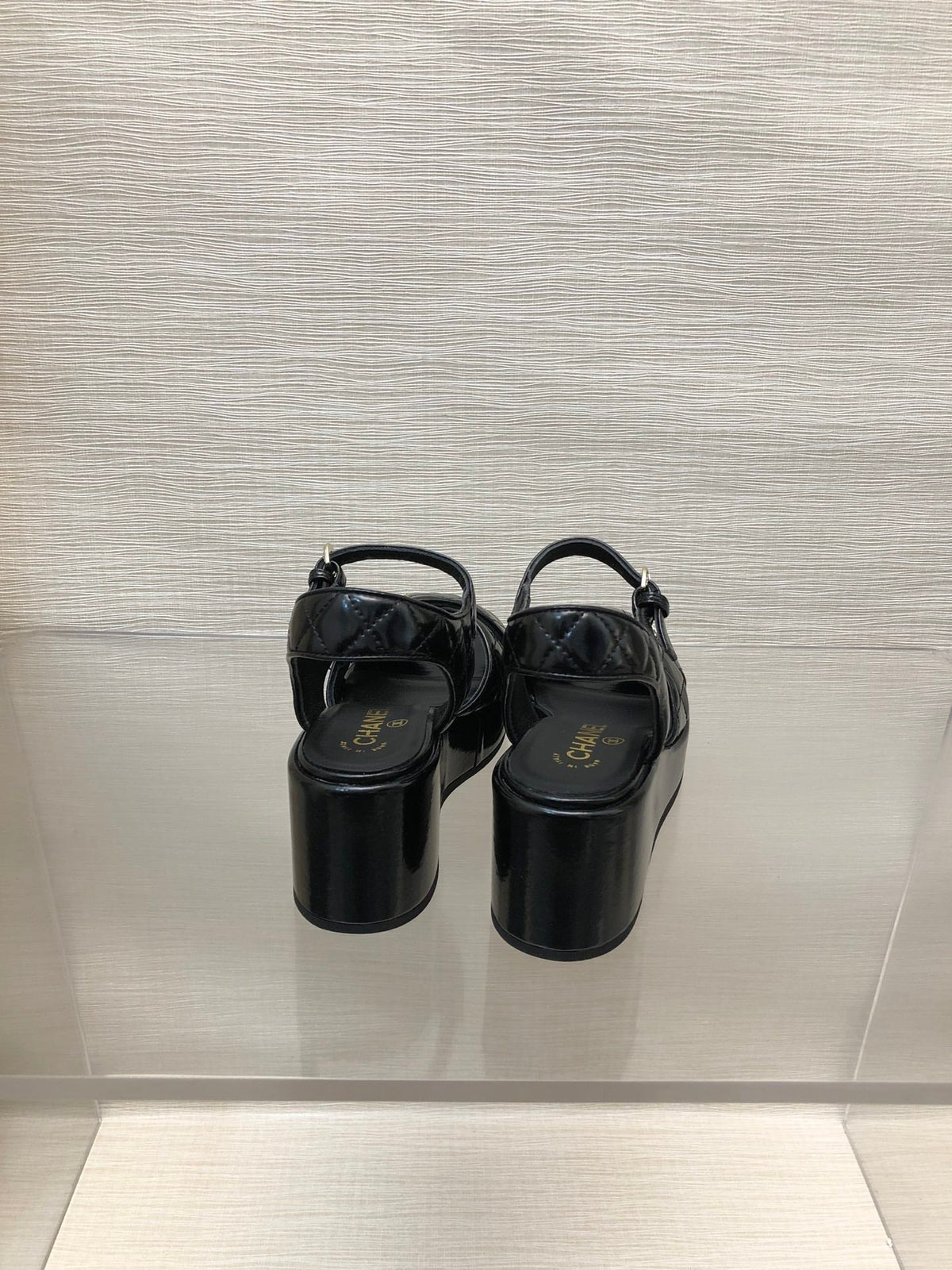 CHANEL WEDGE SANDALS IN BLACK CALFSKIN