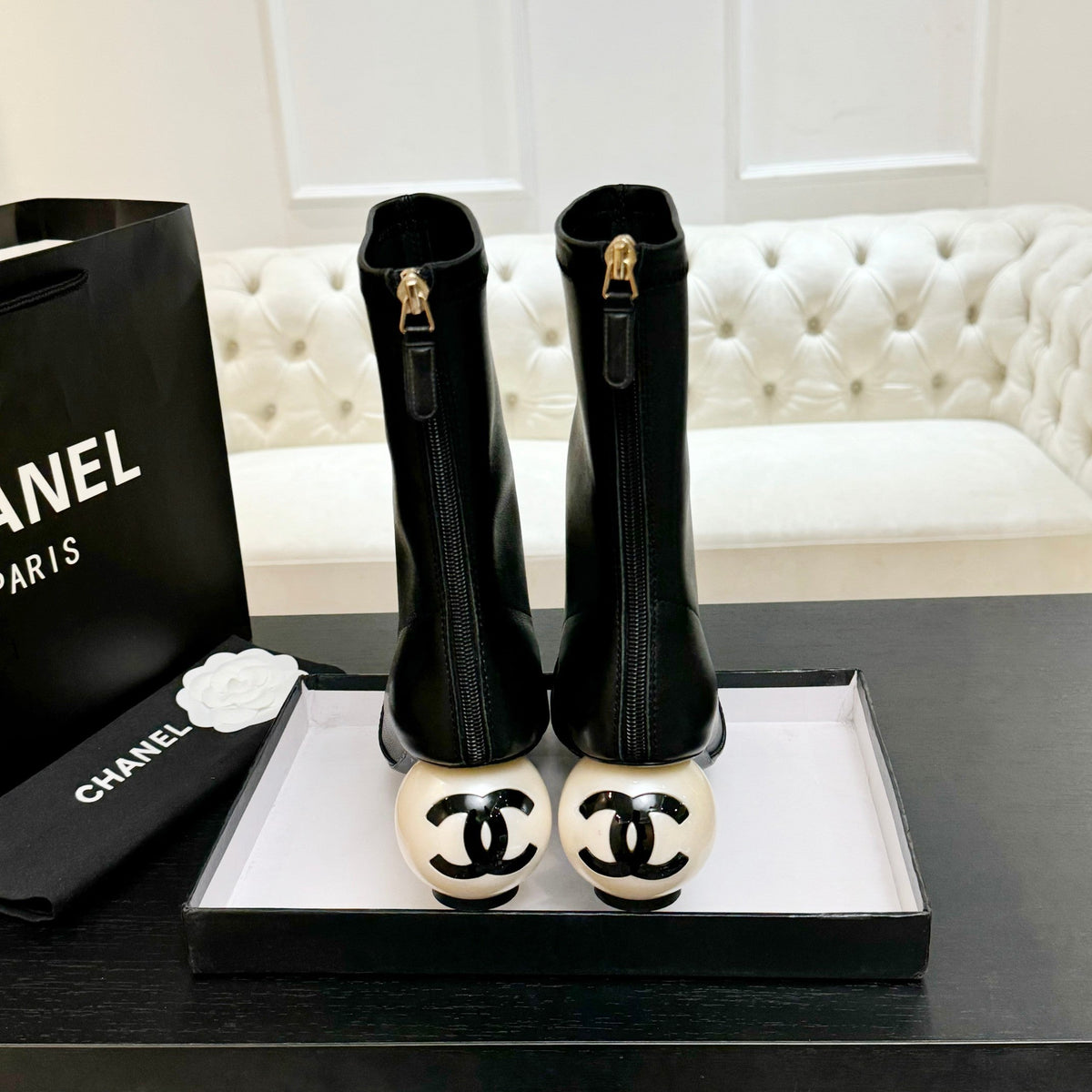 CHANEL PEARL BOOTS 65MM IN BLACK CALFSKIN