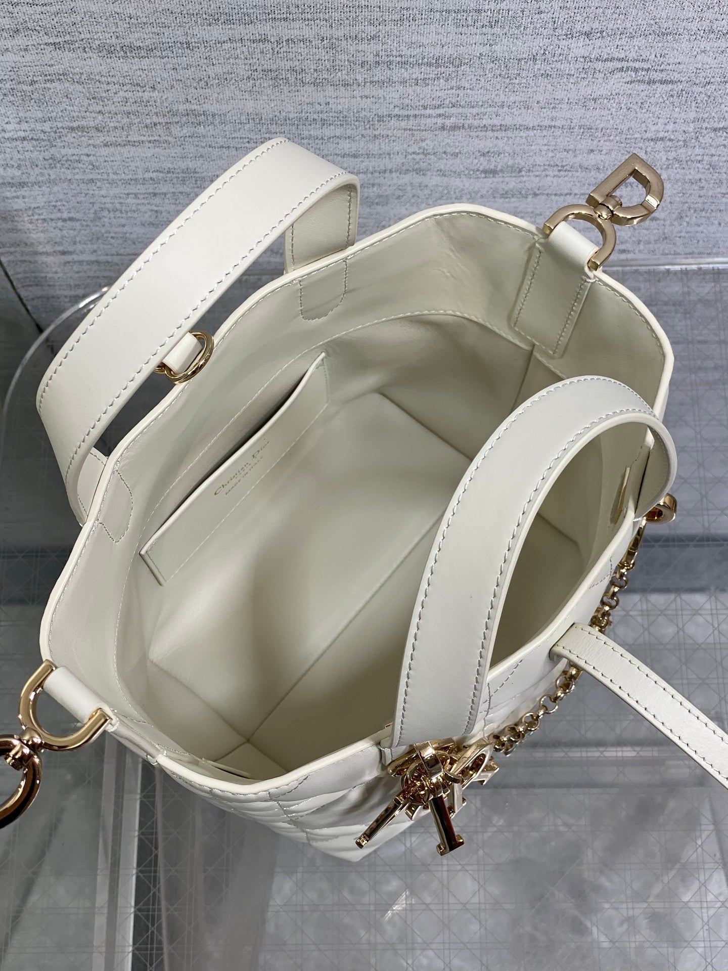 DIOR 25S TOUJOURS VERTICAL TOTE BAG 18 IN IVORY CALFSKIN WITH CHARM BRACELET STRAP