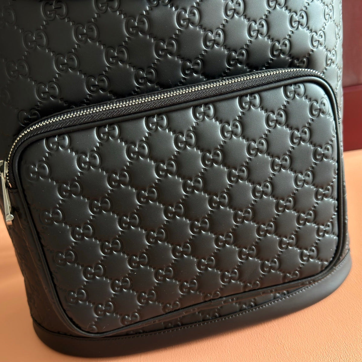 GUCCI 26S  EMBLEM BACKPACK 44 IN BLACK EMBOSSED CALFSKIN