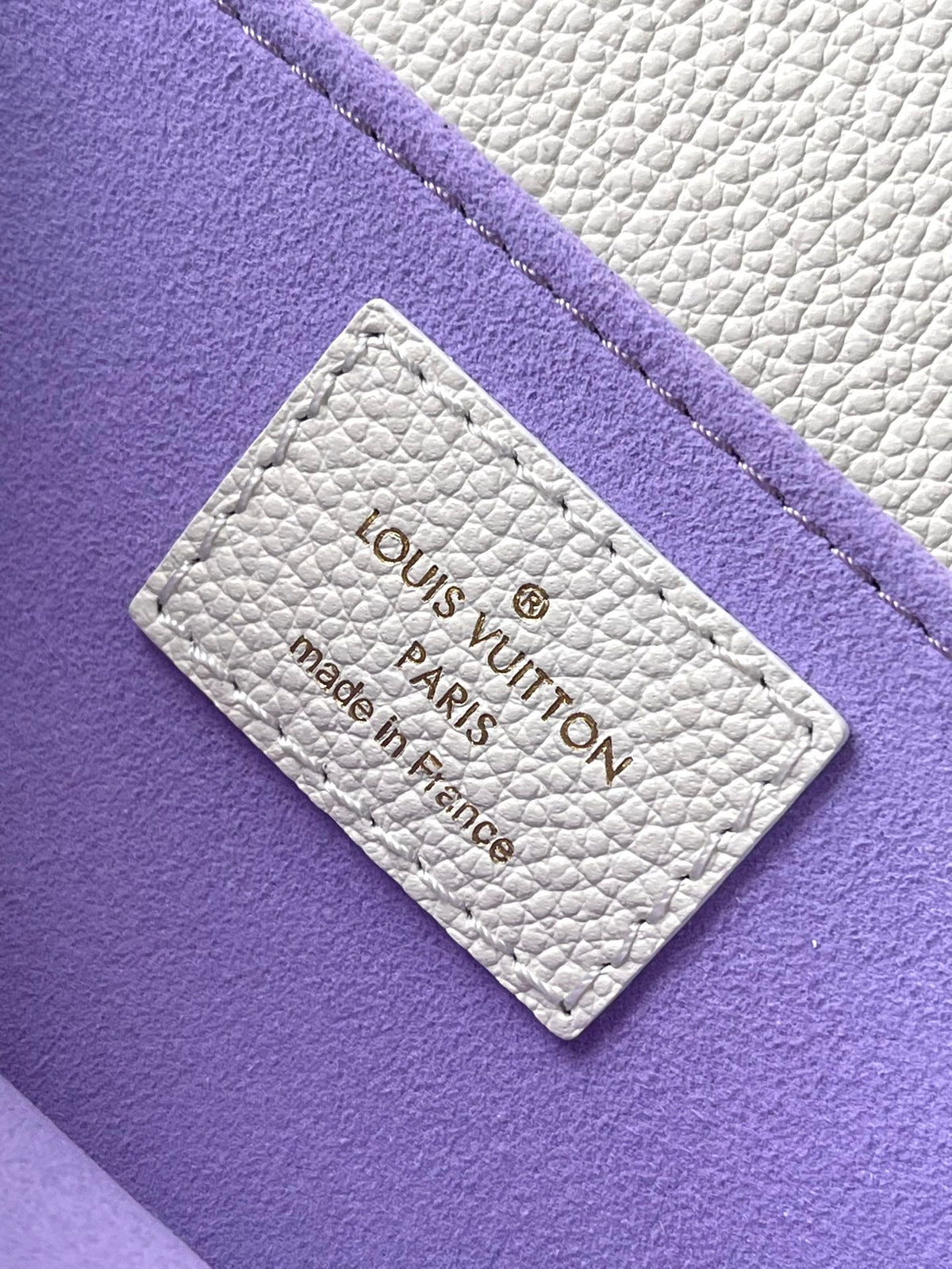 LOUIS VUITTON POCHETTE METIS EAST WEST 21 IN WHITE PURPLE MONOGRAM EMPREINTE LEATHER