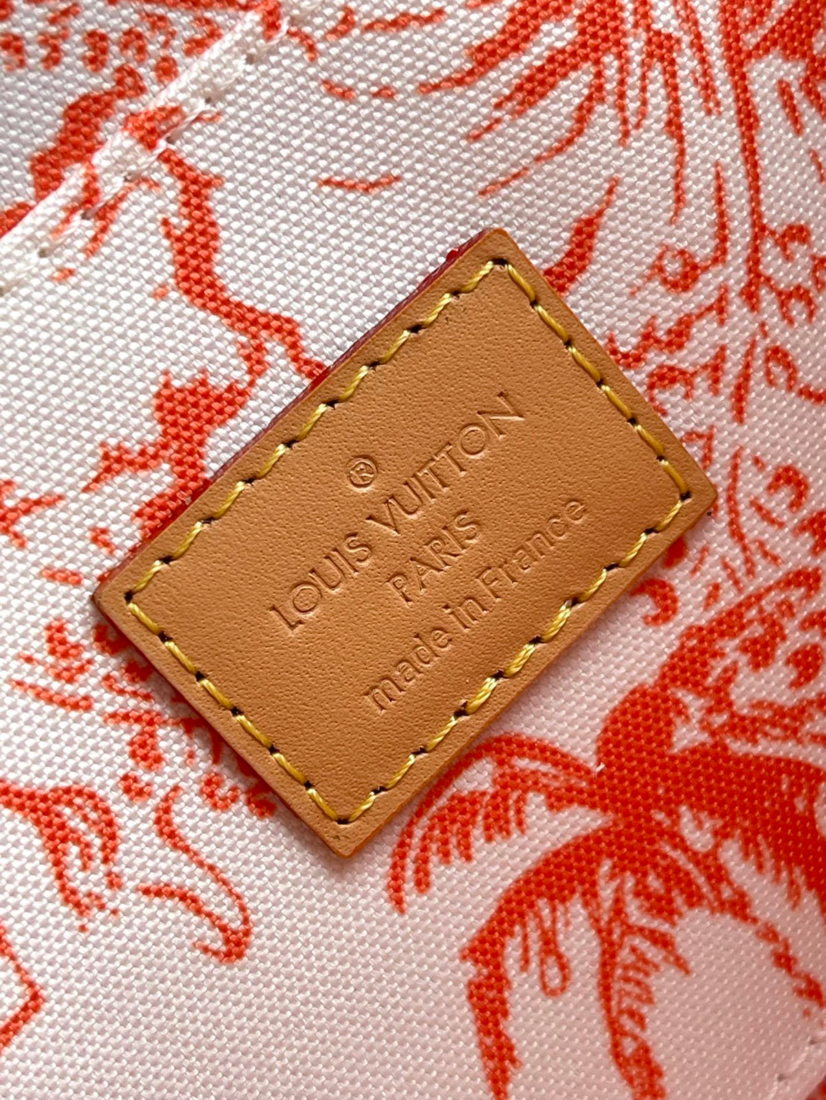 LOUIS VUITTON FÉLICIE POCHETTE 21 IN CORAL MONOGRAM TILES CANVAS