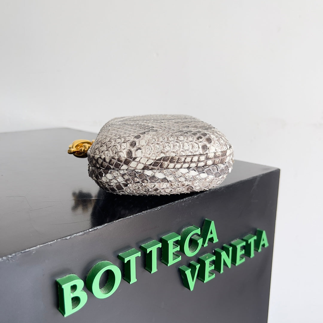 KNOT CHAIN CLUTCH 20.5 IN SNAKE PATTERN CALFSKIN